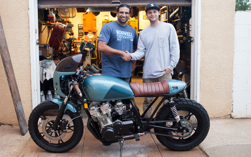 Matthew Ortiz and Swerve Customs' Client, Raaj stand in front of the Custom 1982 Suzuki GS750